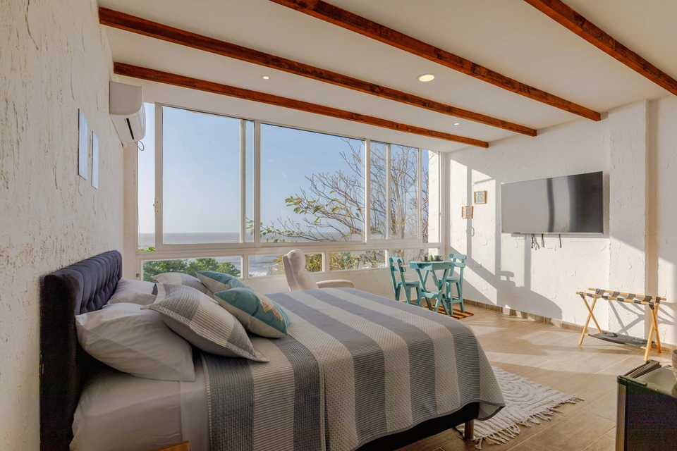 Ocean-view guest room at Puerto Beach House
