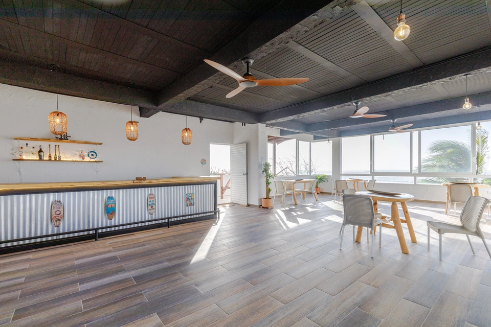 Salon bar and ocean-facing windows